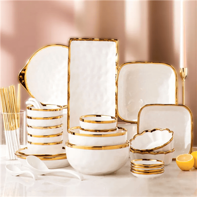 Luxurious Gold Cutlery Set Including Bowls And Plates.